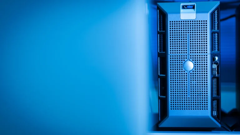 Rows of servers in a data center lit in blue