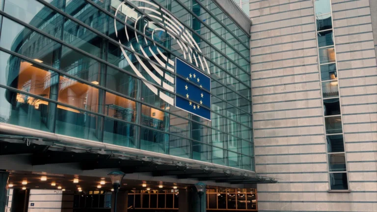 European Parliament building in Brussels with the European Union flag