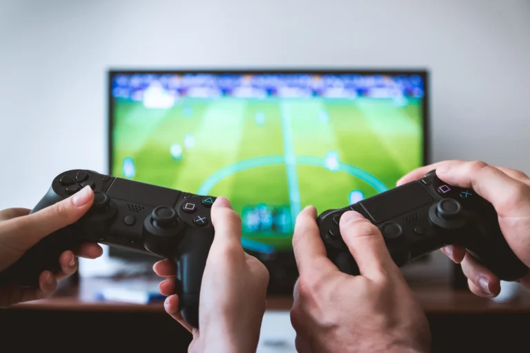 Hands holding a video game controller, representing Tokyo Game Show 2026 announcements