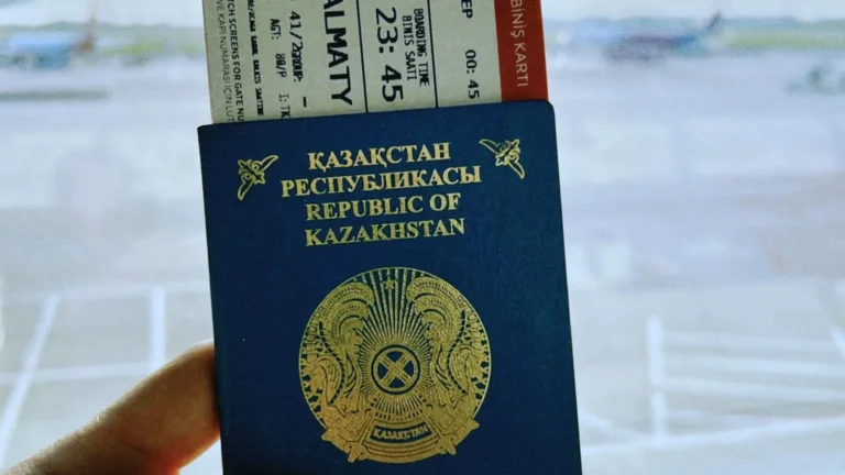 Passport and boarding pass held at an airport