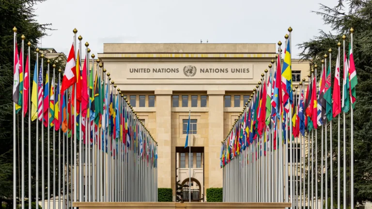 Flags of member countries lining the Allée des Nations at the United Nations Office in Geneva